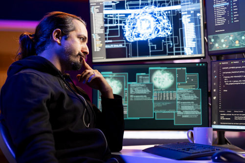 IT analyst reviewing