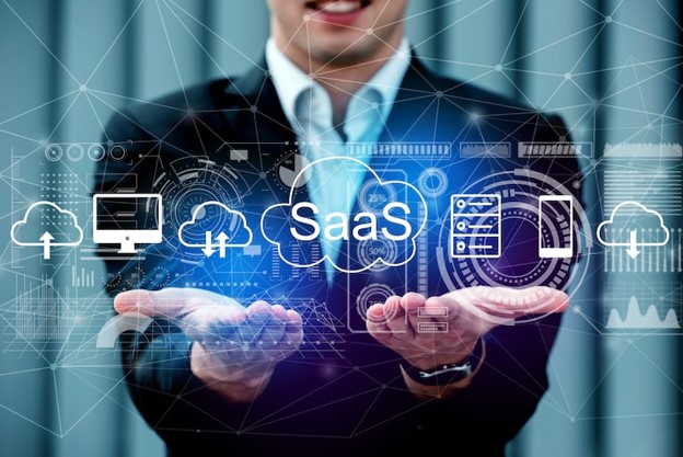 businessman holding SaaS